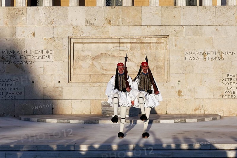 Two Evzones in traditional dress in front of the parliament building, Tomb of the Unknown Soldier, Syntagma Square, Athens, Greece, Europe