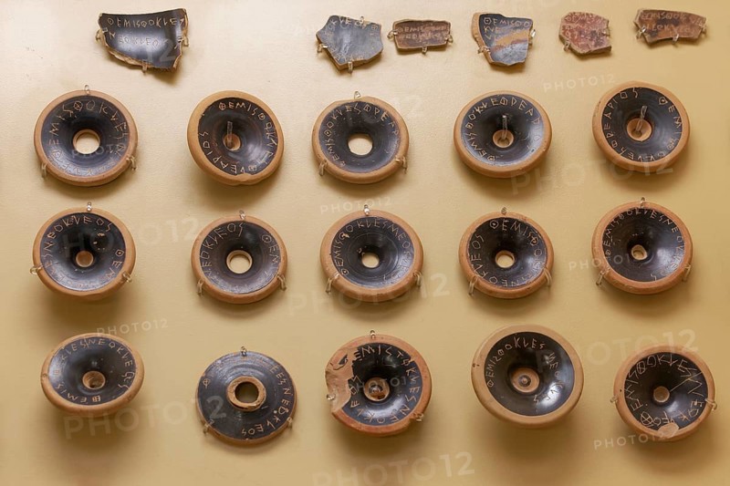 Pottery shards from the ancient court of shards, with the name Themistocles engraved on them, Agora Museum in the Stoa of Attalos, Athens, Greece, Europe