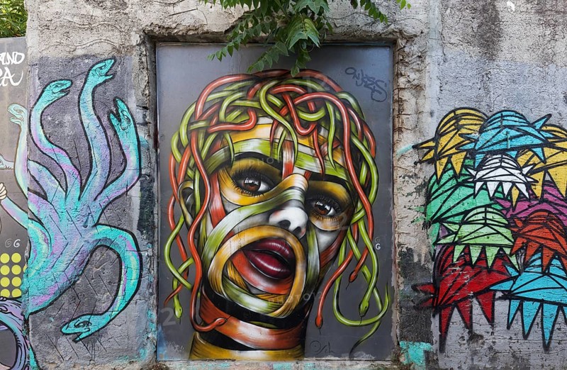 Medusa, female head with hair of colourful snakes, mural in the Anafiotika district, street art, Athens, Greece, Europe