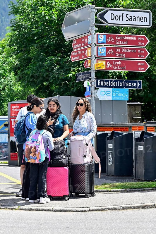 Indian tourists with luggage