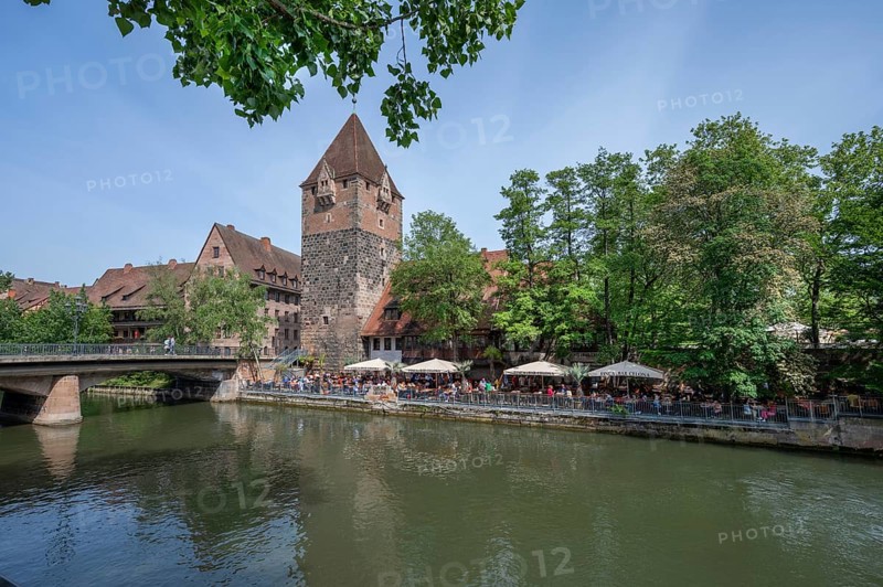Historic debtor's tower, next to it a garden pub on the Pegnitz, Nuremberg, Middle Franconia, Bavaria, Germany, Europe