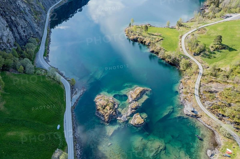 Aerial view of islands in lake Lovatnet (or: Loenvatnet), roads along the lake, valley Lodalen south of village Loen, Norway, Europe