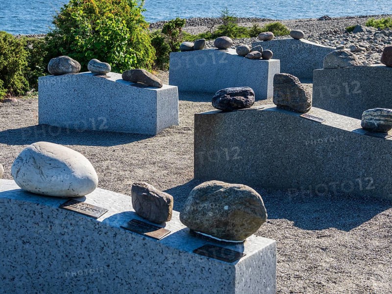 Exhibition of different rock types moved by glacial streams, beach Molen, west of Larvik, Norway, Europe