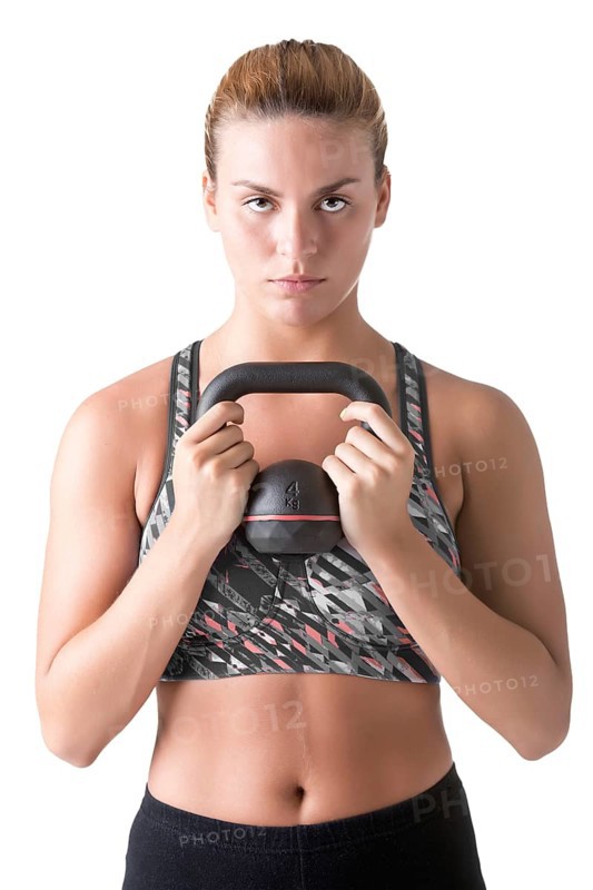 Fit woman working out with a kettlebel and similingl, isolated in white