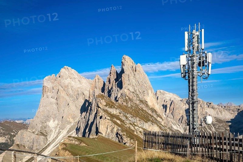 Mobile phone mast on the Seceda in front of the Geisler peaks, Val Gardena, South Tyrol