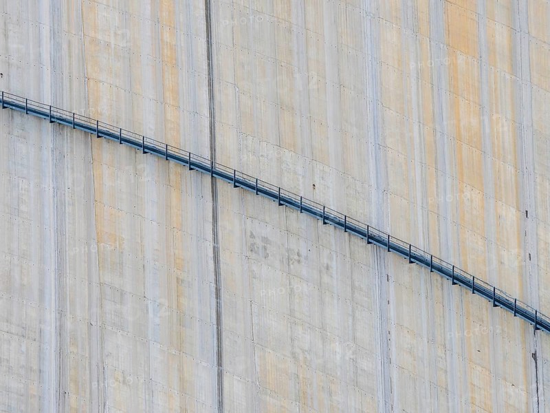Barrage de Mauvoisin, detail of the concrete dam, steel construction along the dam, Switzerland, Europe