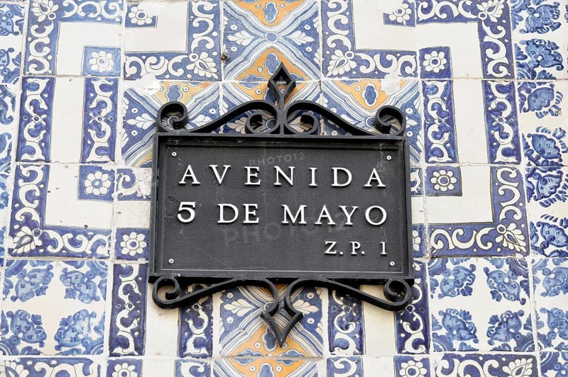 Mexico City, Mexico, Central America, Decorative street sign with blue and white tiles indicating Avenida 5 de Mayo, Central America