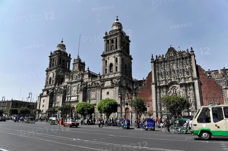 Cathedral, Zocalo, Mexico City, Distrito Federal, Mexico, Central America, Old cathedral with striking towers and detailed stone decorations, surrounded by bustling street vendors, Mexico City, Central America