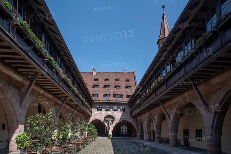 Inner courtyard of the historic Heilig-Geist-Spital, Nuremberg, Middle Franconia, Bavaria, Germany, Europe