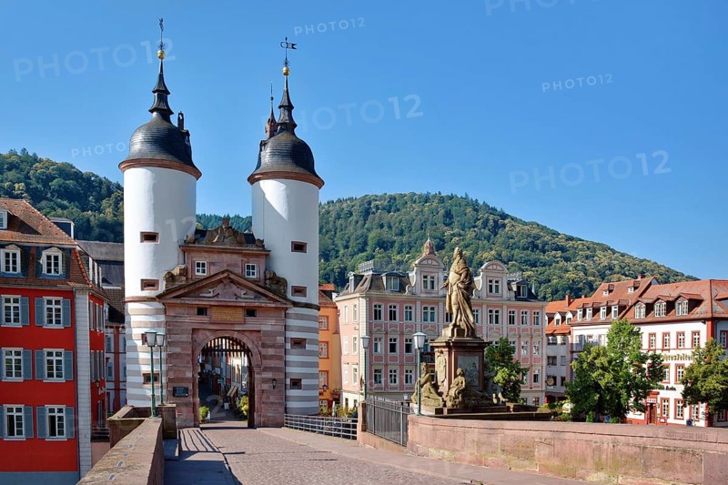 Germany, Heidelberg, June 28th 2024: Gate to 'Karl Theodor Bridge', also known as the Old Bridge, called 'Alte Brücke in German, an arch bridge in city Heidelberg, Europe