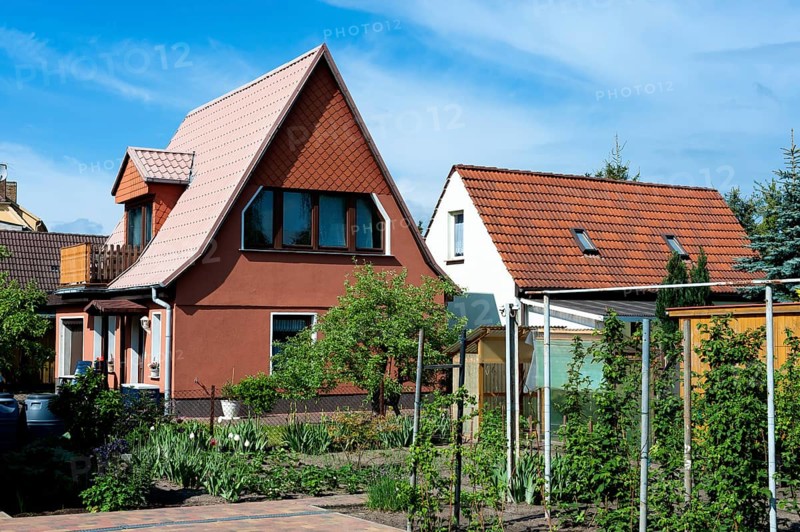 Newly built detached house in a suburban neighbourhood in Germany. Newly build residential in a in a suburban neighbourhood in Germany