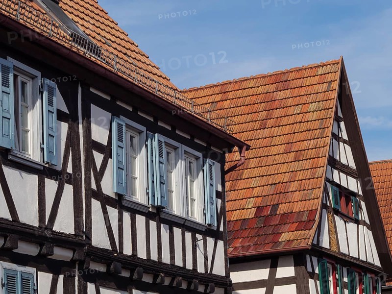 Traditional half-timbered houses with red tiled roofs and occasional open windows, Kandel, Palatinate, Germany, Europe