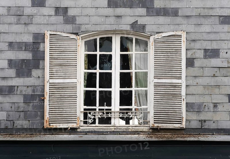 Transom window with shutters in Honfleur Window with shutters in France