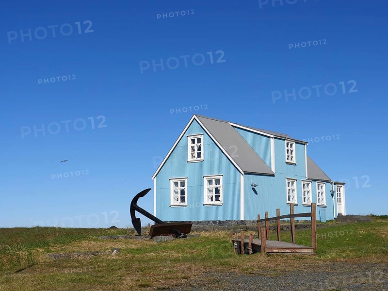 Blue house in Sandgerdi in the west of Iceland