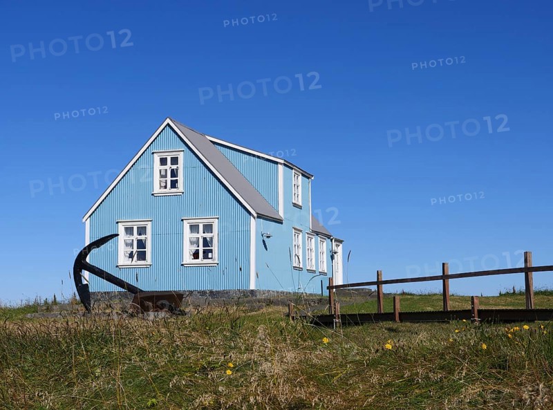 Blue house in Sandgerdi in the west of Iceland