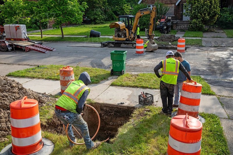Detroit, Michigan, Workers replace old lead water service lines with copper pipes. Lead is harmful to health, especially in children. The city of Detroit estimates there are 80, 000 homes in the city with lead service lines and has begun a program to replace them all