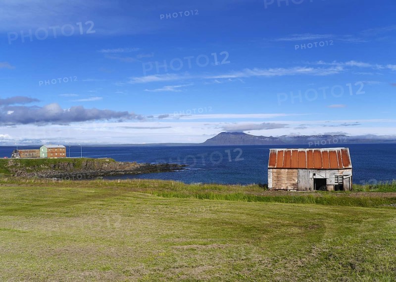 Coast with house in Iceland near Bakkafjordur