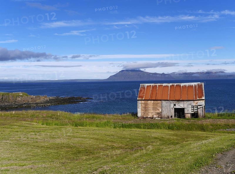 Coast with house in Iceland near Bakkafjordur
