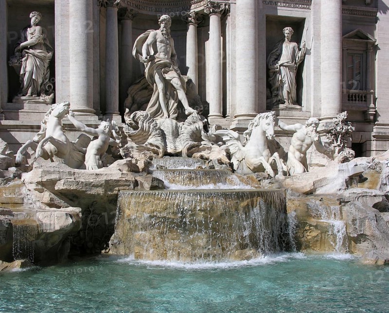 The Trevi Fountain, in Italian Fontana di Trevi, one of the most important sights in Rome, is the most popular and, at around 26 metres high and 50 metres wide, one of the most famous fountains in the world. This largest fountain in Rome was built between 1732 and 1762 to a design by Nicola Salvi. The Trevi Fountain (Italian: Fontana di Trevi) is a fountain in the Trevi rione in Rome, Italy. It is the largest Baroque fountain in the city