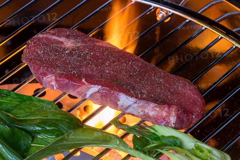 Steak with pak choi on the bbq