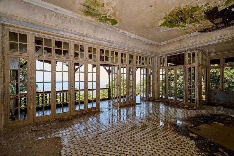 Abandoned room with broken windows, dilapidated floor and view of the green nature, Mussolini Villa, Villa de Vecchi, Profitis Ilias, Empona, Rhodes, Dodecanese, Greek Islands, Greece, Europe