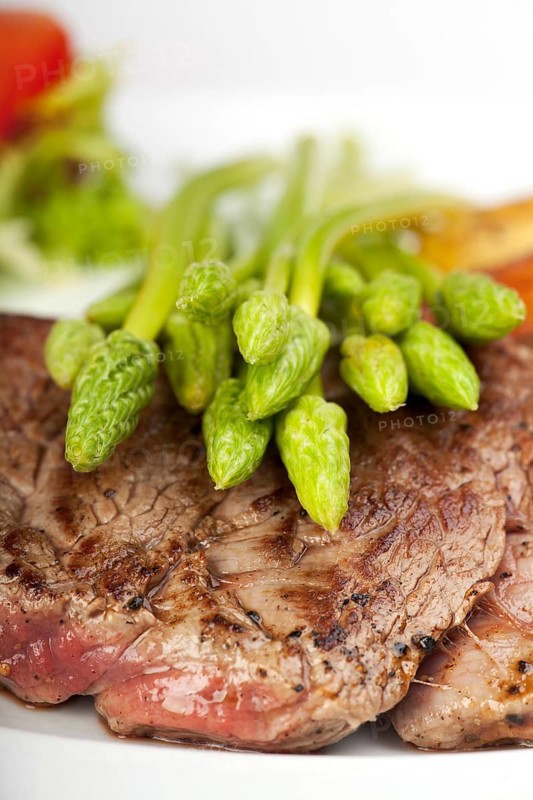 Wild asparagus on steak