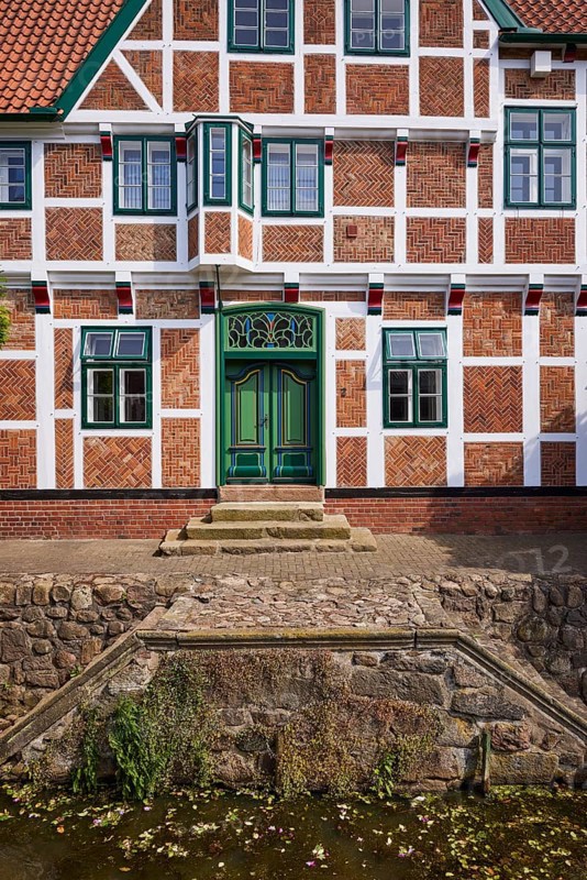 Stairs from the Jorker Hauptwettern moat to the town hall in Jork, Altes Land, Stade district, Lower Saxony, Germany, Europe