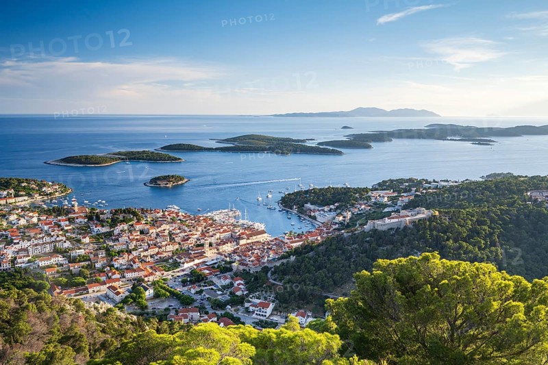View of the old town centre of Hvar, behind Pakleni or Paklinski Islands, Dalmatia, Croatia, Europe
