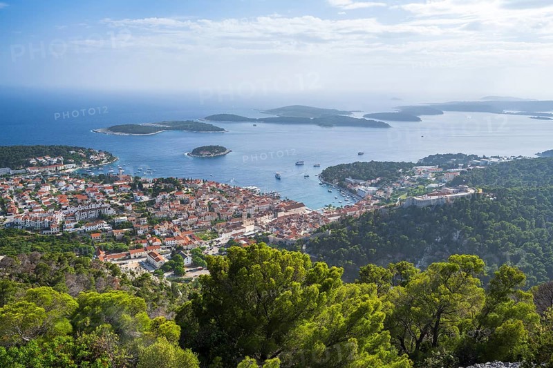 View of the old town centre of Hvar, behind Pakleni or Paklinski Islands, Dalmatia, Croatia, Europe