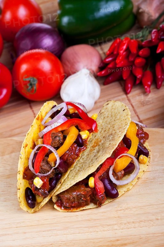 Tortilla filled with beans and meat sauce