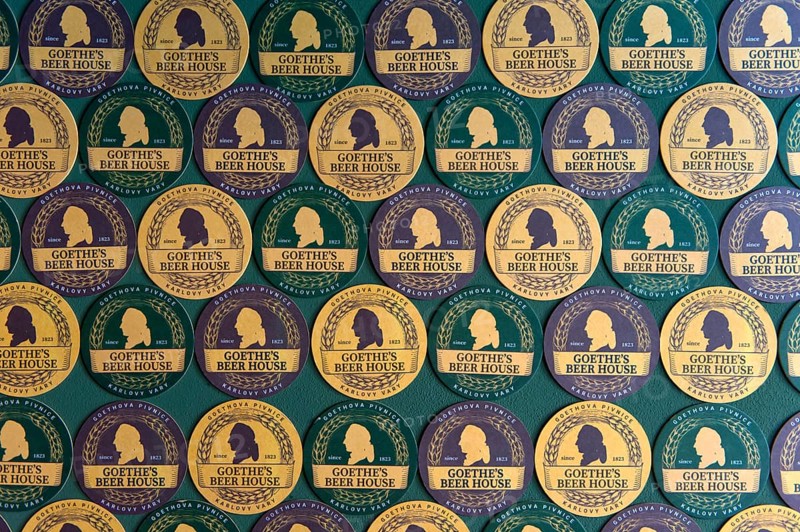 Beer mat with the portrait of Goethe as wall decoration in Goethe's Bierhaus, Karlsbad, Karlovy Vary, Bohemia, Czech Republic, Europe