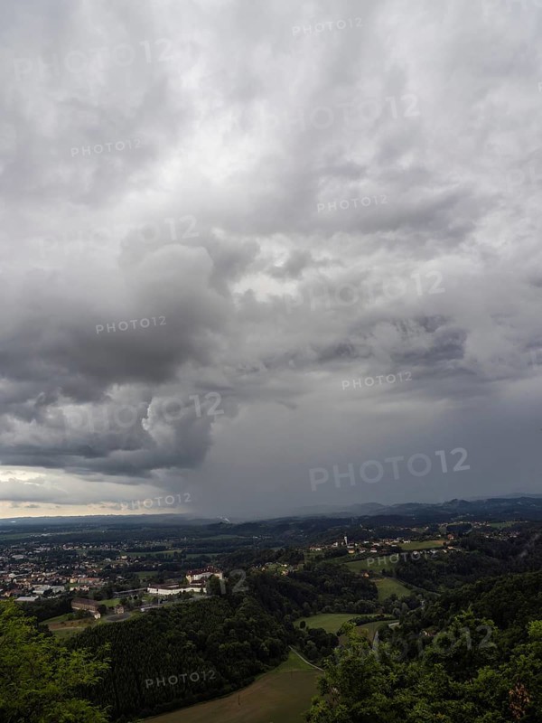 Storm clouds over Leibnitz, Seggau Castle, Frauenberg pilgrimage church in the background, view from the Kreuzkogel lookout point, panoramic photo, Kogelberg near Leibnitz, Styria, Austria, Europe