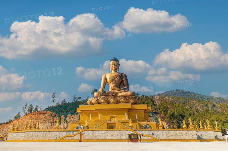 169 feet tall bronze Buddha statue shining bright in the daytime