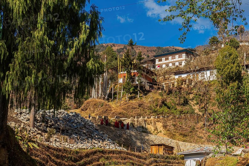 View of the Trongsa Dzong on a sunny day with blue sky