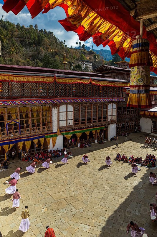 Monks rehearsing the dance of demons in the Lord of Death at Tsechu festival in the Trongsa Dzong in rural Bhutan
