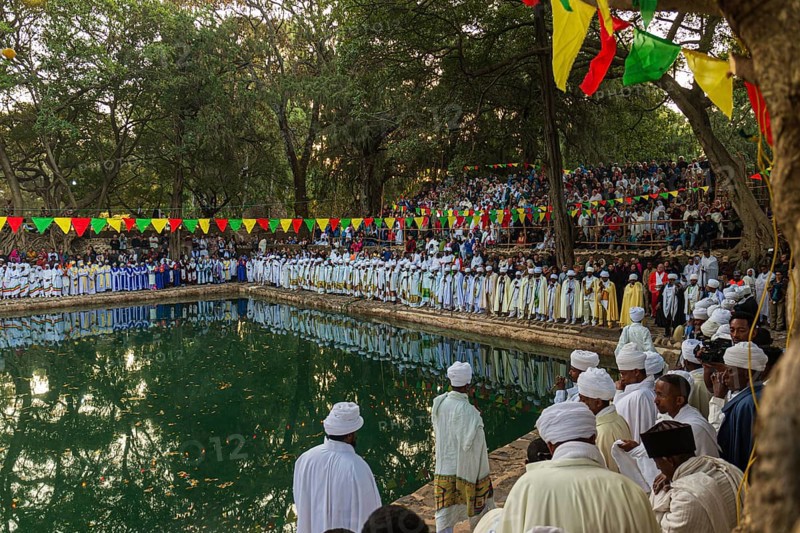 People gathering at Timkat festival at Fasilides Bath in Gondar, Ethiopia, Africa
