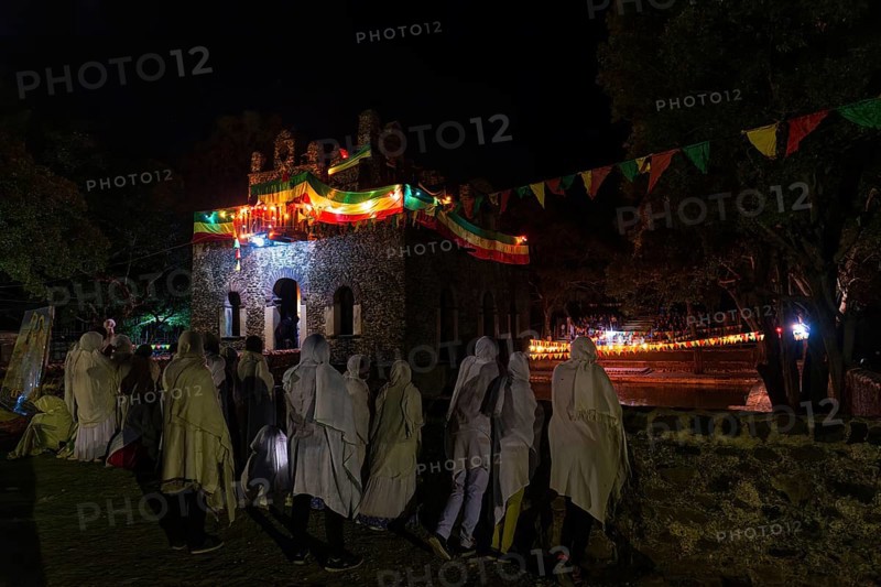 People gathering at Timkat festival at Fasilides Bath in Gondar, Ethiopia, Africa