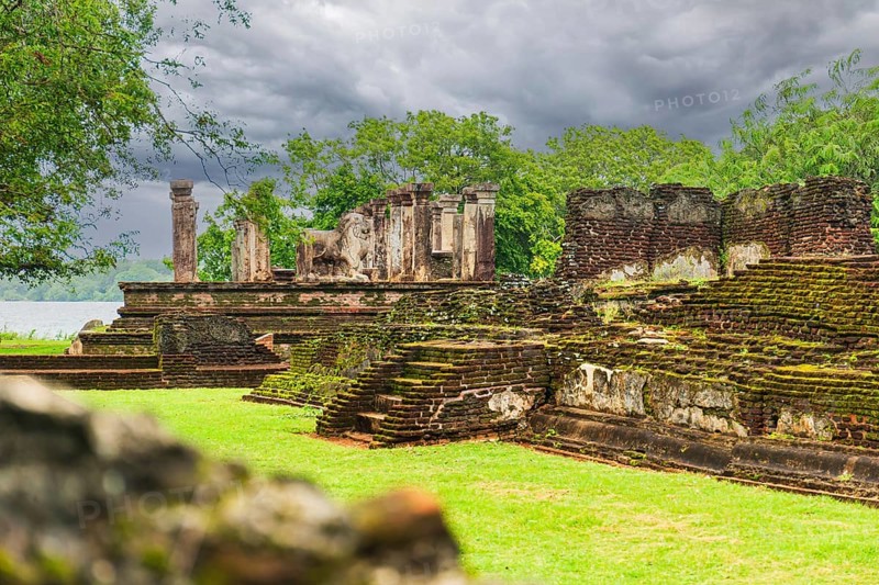 Angled view of the steps and lion carvings that lead to the audience hall, part of the ruins of the ancient kingdom capitol in Polonnaruwa, Sri Lanka, Asia