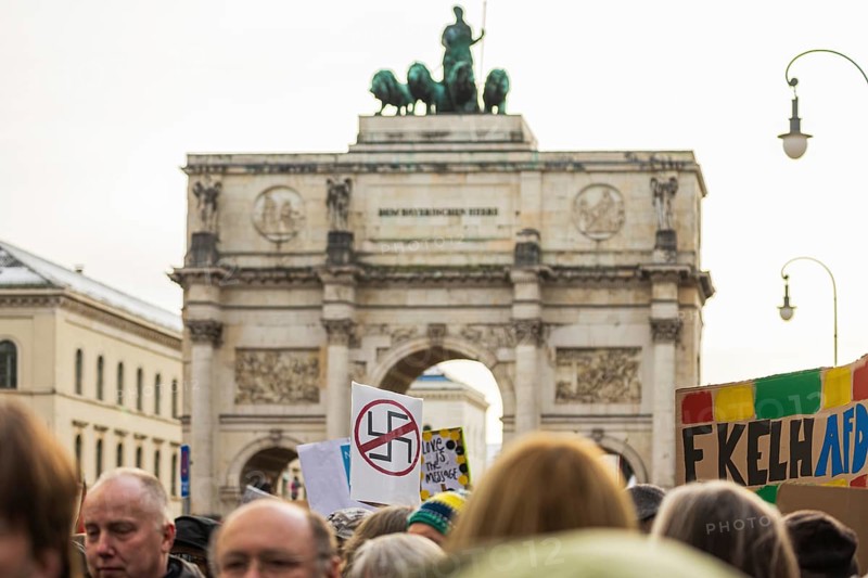 People holding banners against the right wing party AfD at a manifastation in Munich, Germany, Europe