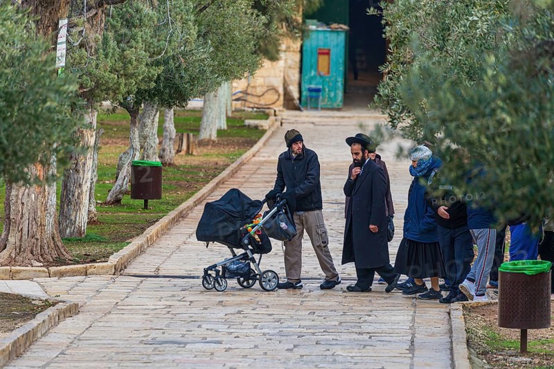 A group of Israeli Jews visiting the temple Mount despite official rabbinic ban on setting foot on the sacred site