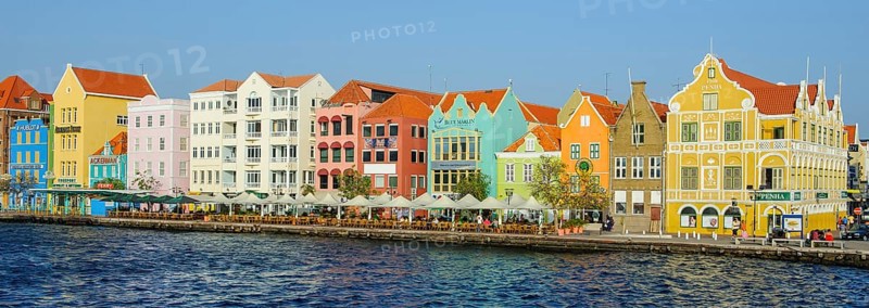 Panorama panoramic photo of landmark of Willemstad Curacao sunlit trading cade houses in colonial style in Dutch Dutch Caribbean, Caribbean, Windward Islands, Netherlands Antilles, ABC Islands ABC Islands, Willemstad, Curaçao Curacao