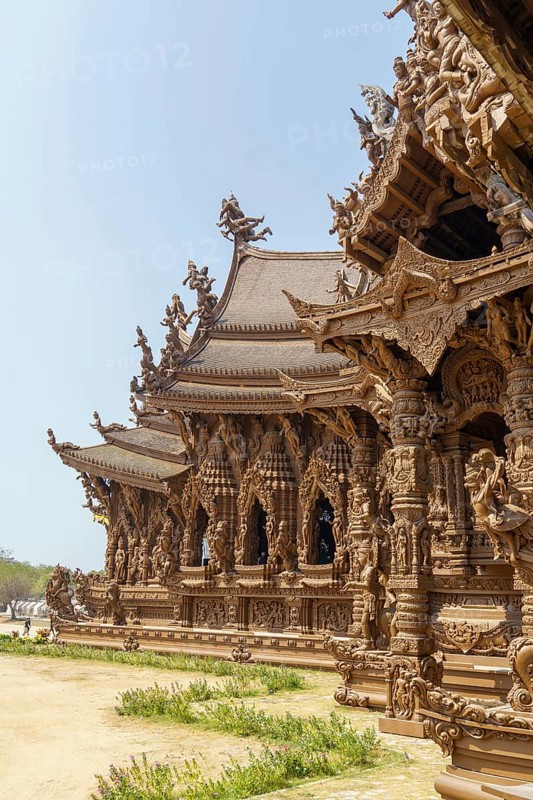 Detailed view of an ornate wooden temple, light and shadow effects on the structure, Pattaya, Thailand, Asia