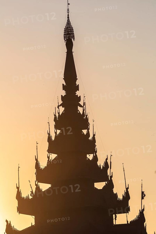 Pagoda silhouette during a sunset in Mandalay, Myanmar (Burma)