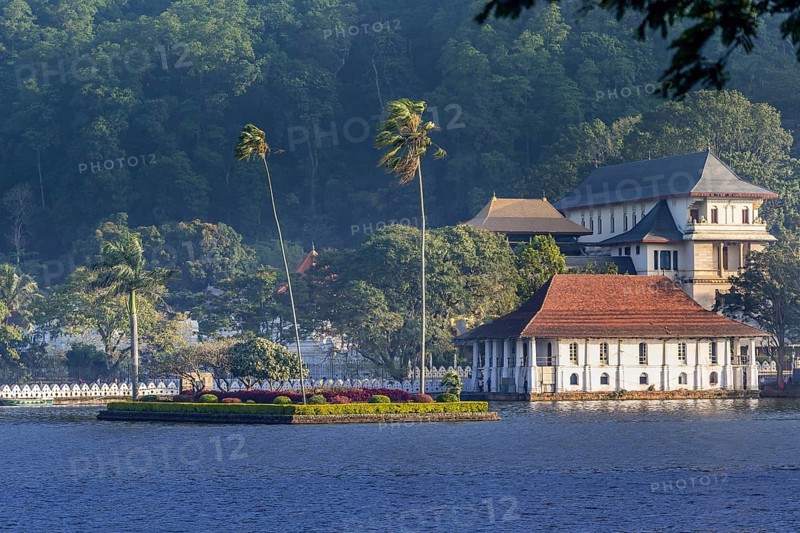 Temple of the Sacred Tooth Relic with it's lake in the foreground