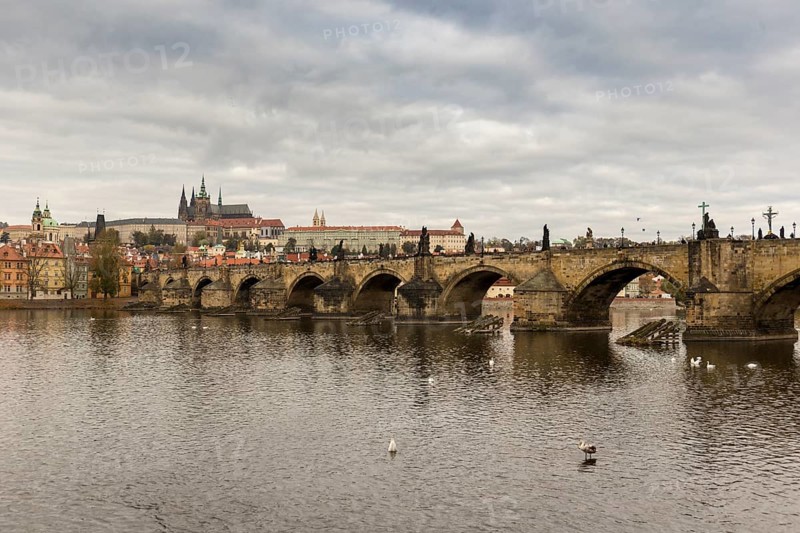 Charles Bridge in Prague on a beautiful autumn day