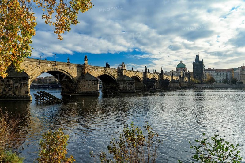 Charles Bridge in Prague on a beautiful autumn day