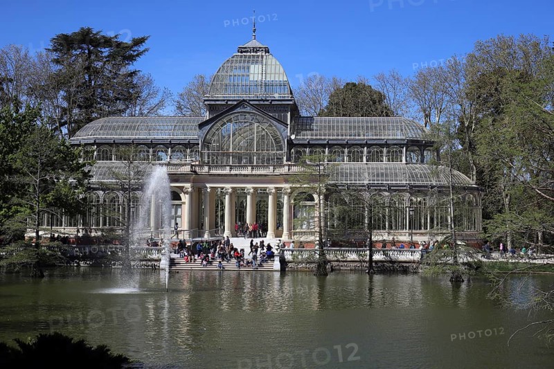 Palacio de Cristal, Parque del Retiro, Spain Crystal palace surrounded by spring green. Front view