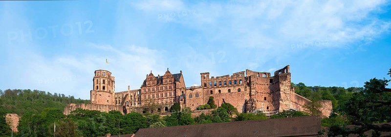 Heidelberg, mediaevial castle, red sandstone ruins tower looms majestically over the Neckar river and valley