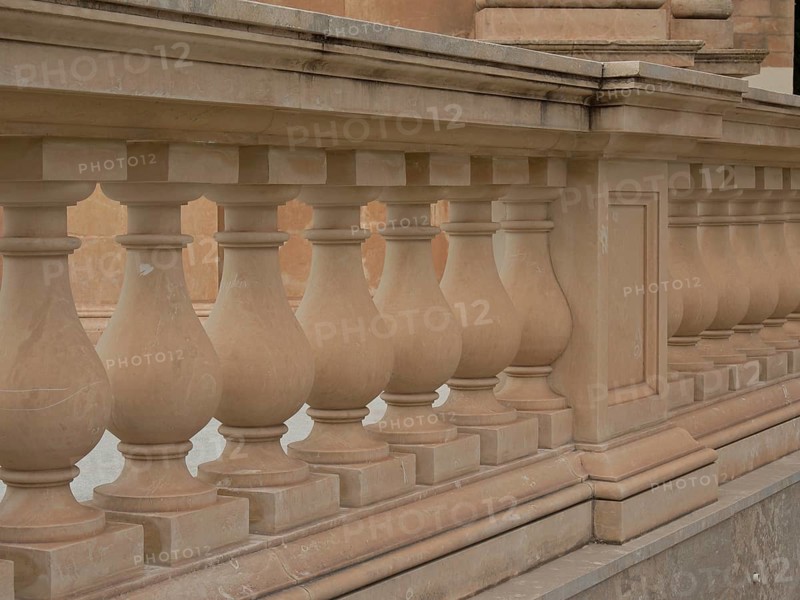 Detail of a classically designed stone balustrade from a building, marsaxlokk, mediterranean sea, malta