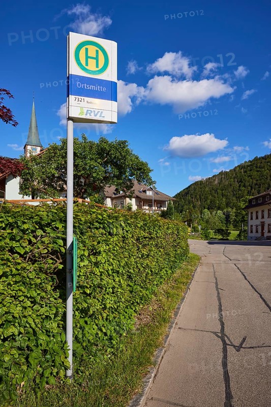 Bus stop in the centre of the 7321 bus route with St. Wendelin church in the historic district of Geschwend, Todtnau, Black Forest, Lorrach district, Baden-Württemberg, Germany, Europe